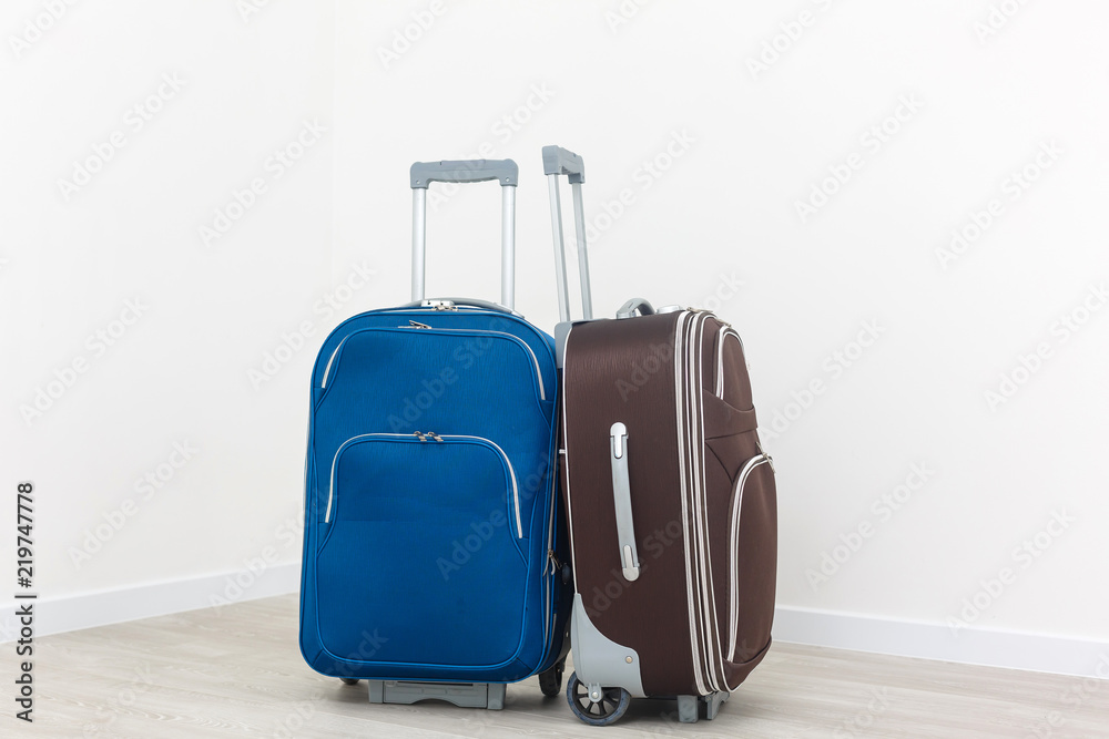 Travel suitcases isolated on white background.
