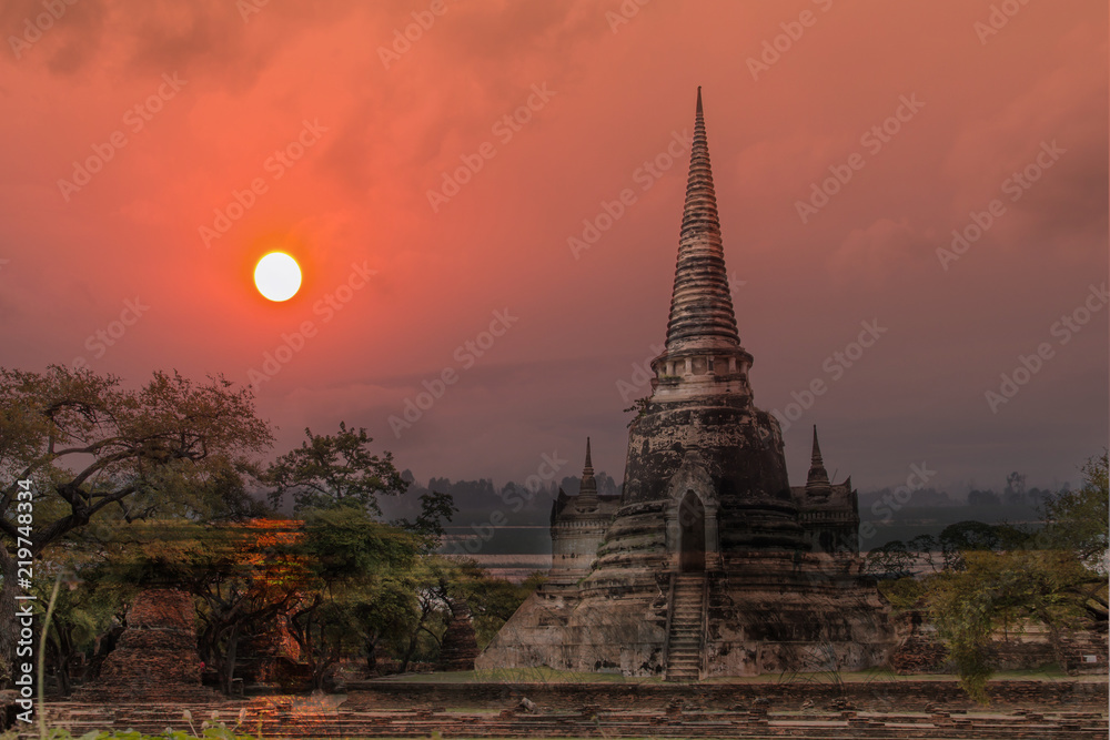 Fototapeta premium Double exposure sculpture Landscape of Ancient old pagoda is Famous Landmark old History Buddhist temple,Beautiful Wat Chai Watthanaram temple in ayutthaya Thailand