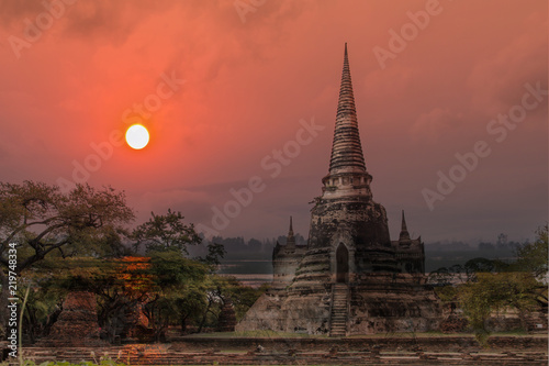 Double exposure sculpture Landscape of Ancient old pagoda is Famous Landmark old History Buddhist temple Beautiful Wat Chai Watthanaram temple in ayutthaya Thailand