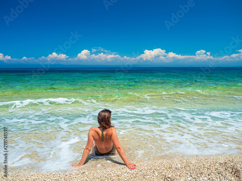 woman sunbathing on the beach