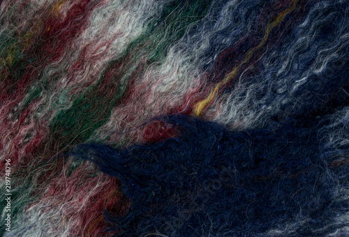 Woolen multi-colored fabric.