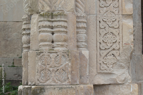 Decorated part of the wall of the temple Bagrati. Old Georgian traditional ornament on stone