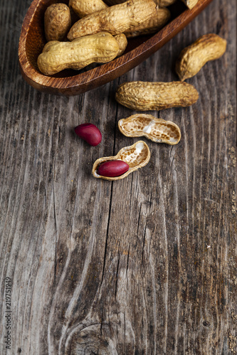 Peanuts in a wooden bowl