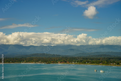 Summer panoramic view of the sea and mountain range