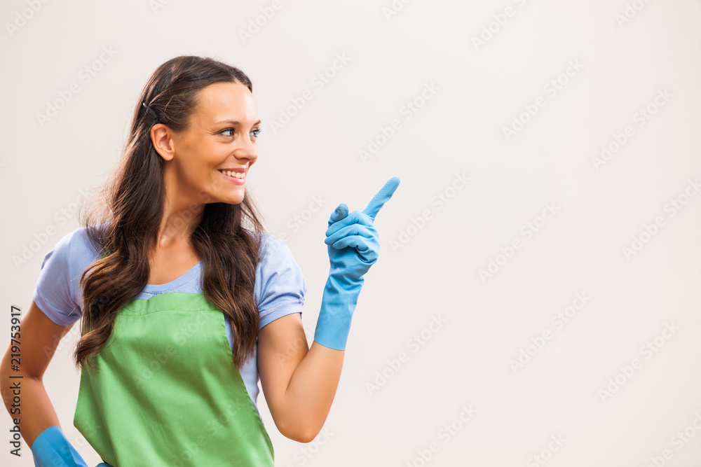 Portrait of housewife who is ready for housework. Portrait of housewife who is ready for housework.