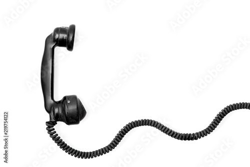 vintage phone hanset with cord on white background