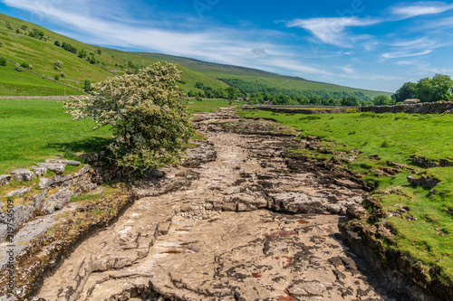 Yorkshire landscape with the dried-up River Skirfare near Litton, North Yorkshire, England, UK