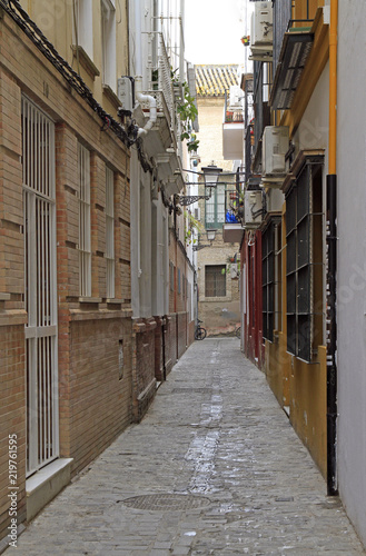 narrow street in the old city of Seville © babble