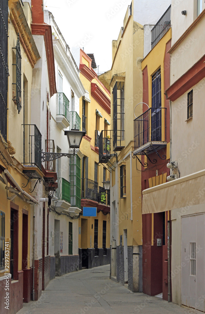 narrow street in the old city of Seville