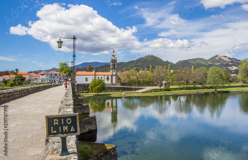 Sign on the roman bridge in Ponte de Lima, Portugal photo