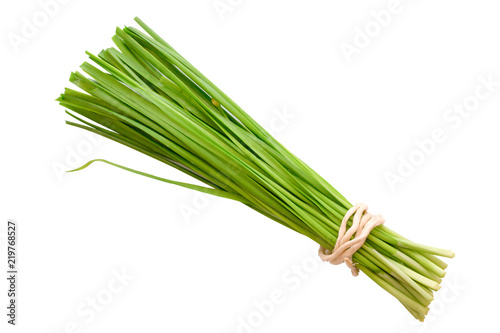 Fresh healthy organic green vegetable garlic chives, chinese chive bunch, green herb isolated on white background.