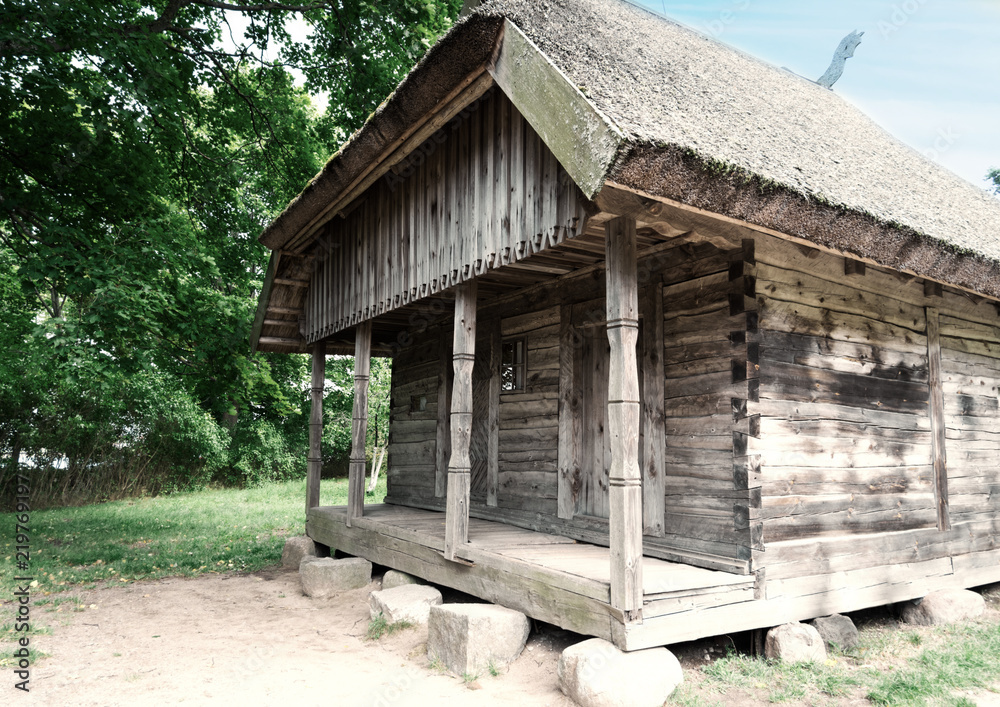 Old fashioned timber house in XIX century village Old fashioned timber house in XIX century village