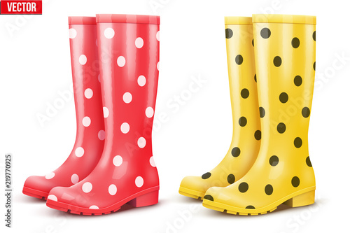 Set of rubber rain boots. Fashion Symbol of garden wok or autumn and bad weather. Read and yellow color with dots. Vector illustration Isolated on white background.