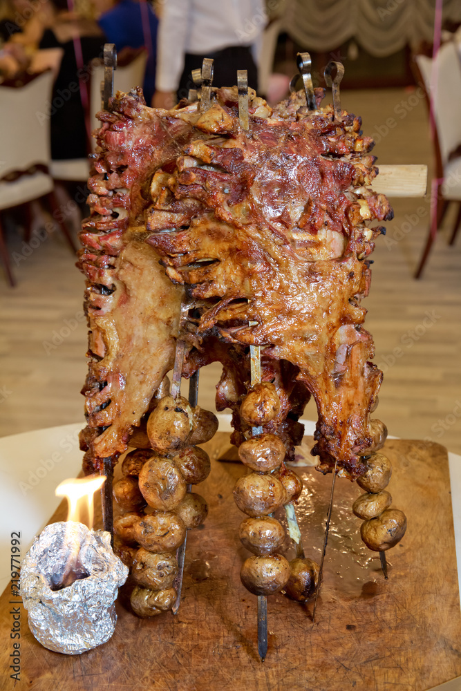 Roasted meat over an open fire, cooked in a special way.Barbecue is prepared of lamb or sheep meat and processed by slasher.