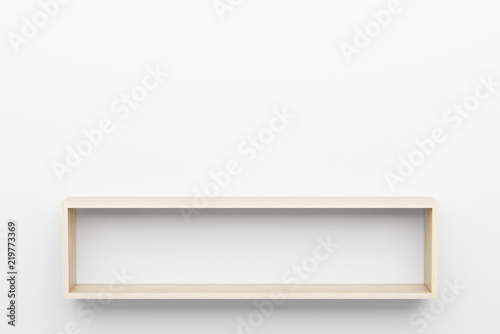 Fototapeta Naklejka Na Ścianę i Meble -  empty wooden shelves on white wall with light from the top
