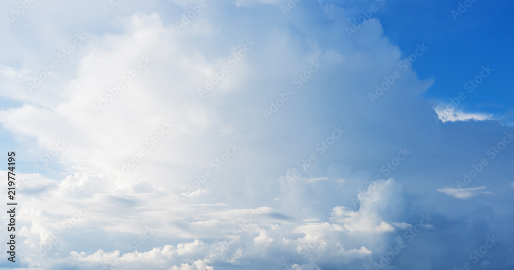 Blue sky background with clouds. Close up. Blue sky background with clouds. Close up.