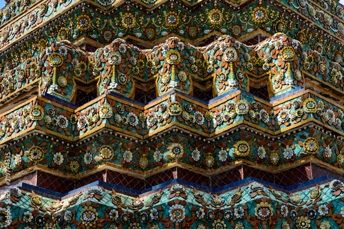 Close up beauitful mosaic tiles of large stupas in Wat Pho or Wat Phra Chetuphon Vimolmangklararm Rajwaramahaviharn is one of Bangkok's oldest temples