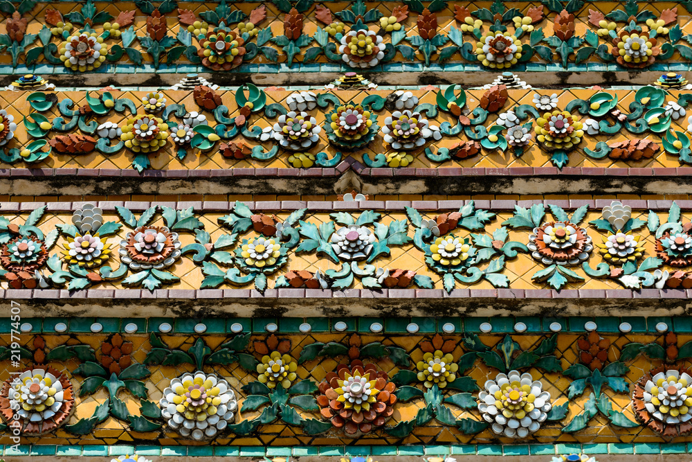 Close up beauitful mosaic tiles of large stupas in Wat Pho or Wat Phra Chetuphon Vimolmangklararm Rajwaramahaviharn is one of Bangkok's oldest temples