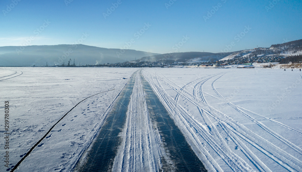 Winter road along the lake Baikal