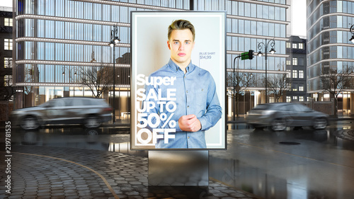 sale advertisement on billboard on city downtown photo