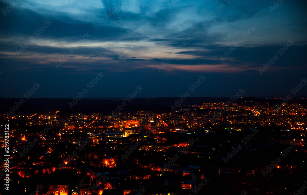 night aerial view of the populous with many city lights