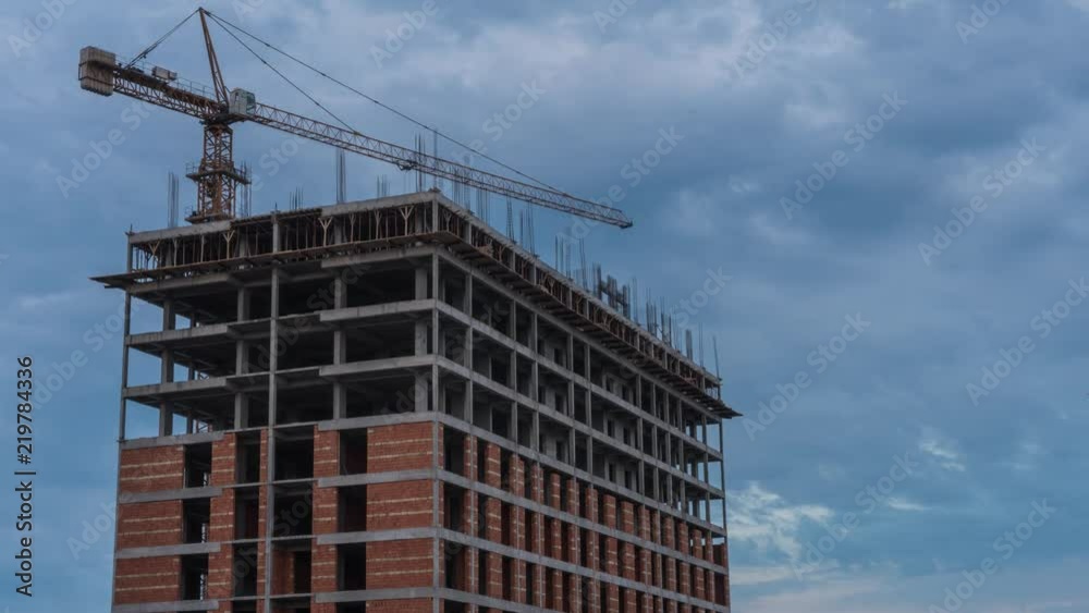 Construction of a high-rise building during the day. Time lapse 4k Construction of a high-rise building during the day. Time lapse 4k
