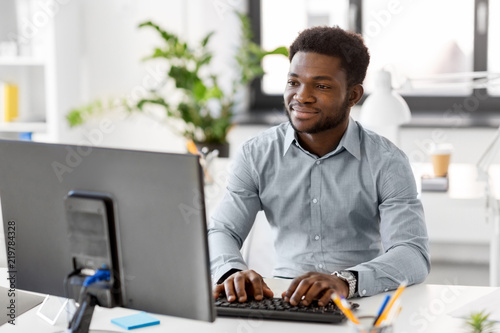 Fotografija business, people and technology concept - african american businessman with comp