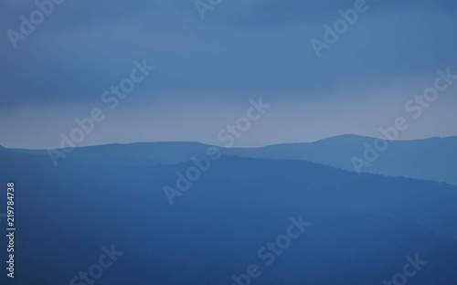 Morning landscape. Silhouette of mountain ranges