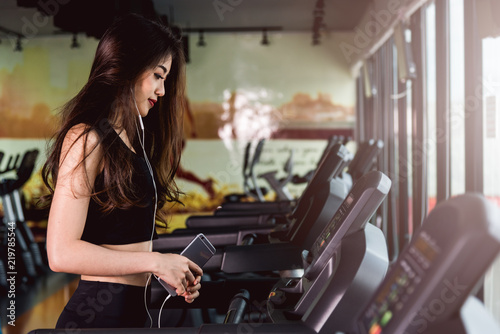 Woman lifestyle use technology smartphone music exercise