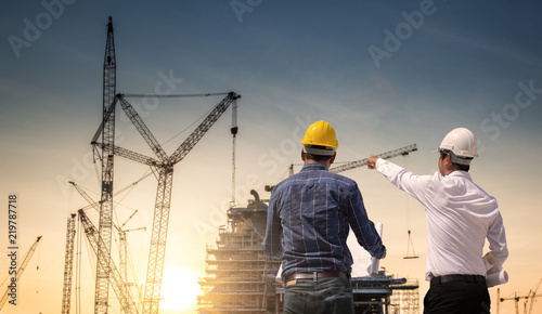 Wallpaper Mural two construction engineer working in construction site and management in the construction site Torontodigital.ca