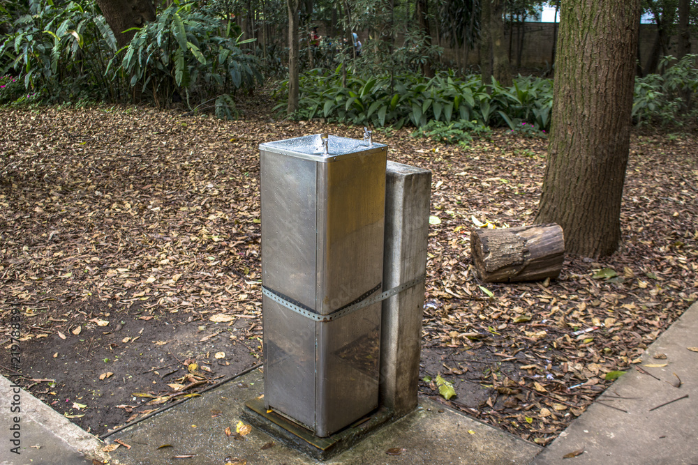 water fountain in public park on rainy day water fountain in public park on rainy day