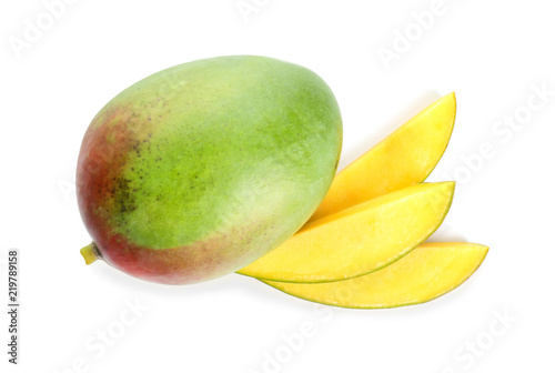 Whole and sliced mango on white background