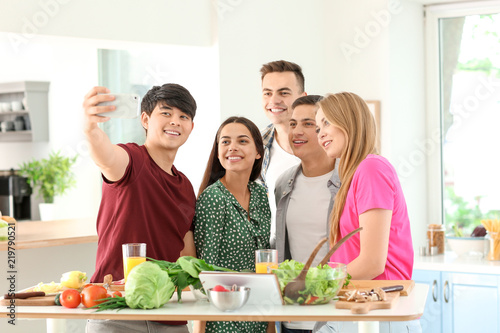 Happy friends taking selfie...