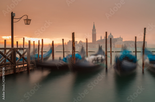 Morning in Venice. Gondolas at the pier. Italy. © SOLOTU