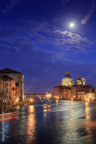 The moon shines over Venice. Picture taken from the Academy bridge. Italy. © SOLOTU