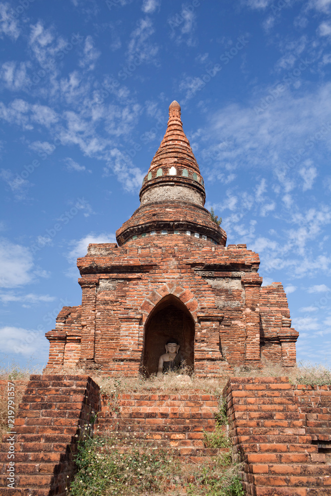 Ancient pagoda with Buddha statue inside in Bagan, Mandalay Division of Myanmar