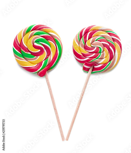 Colorful lollipops on white background