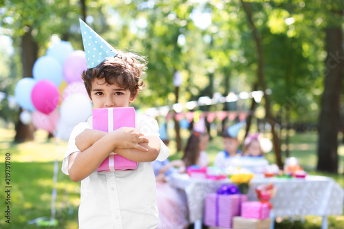 Cute little boy with gift b...