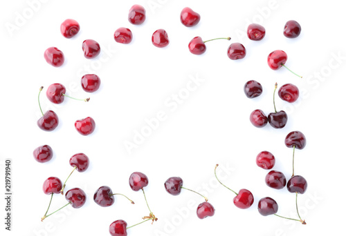 Frame made of ripe cherry on white background
