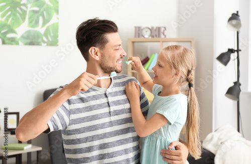 Man and his little daughter...