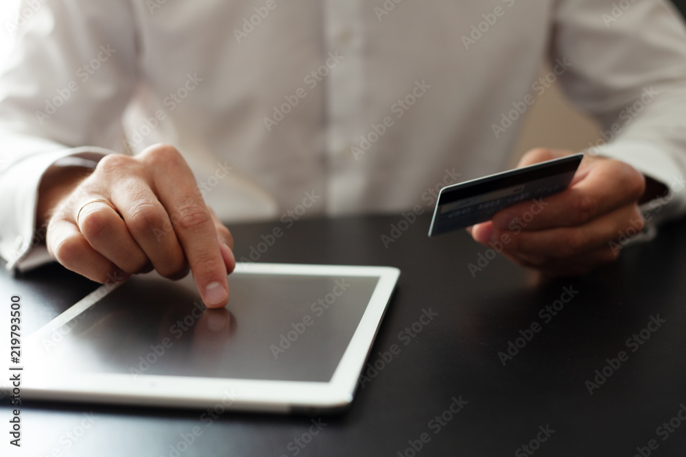 Man using Tablet pc. Credit card, Shopping online. Man using Tablet pc. Credit card, Shopping online.