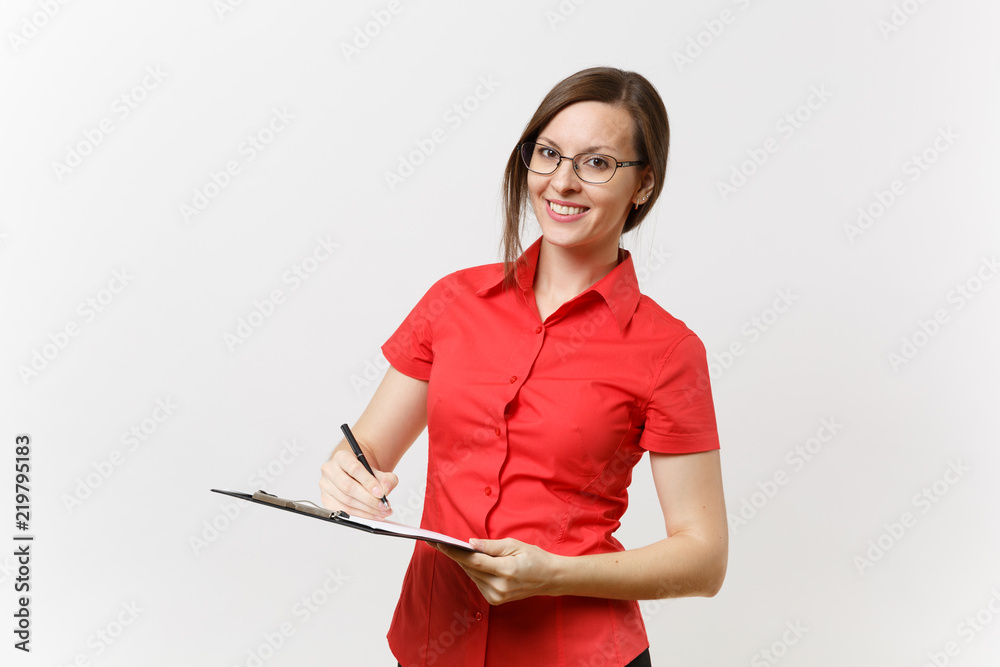 Portrait of young business teacher woman in red shirt, glasses holding pen clipboard with blank empty paper documents isolated on white background. Education teaching in high school university concept Portrait of young business teacher woman in red shirt, glasses holding pen clipboard with blank empty paper documents isolated on white background. Education teaching in high school university concept