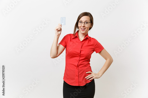 Portrait of pretty young business teacher woman in red shirt skirt glasses holding cedit bank card, cashless money isolated on white background. Education teaching in high school university concept. photo