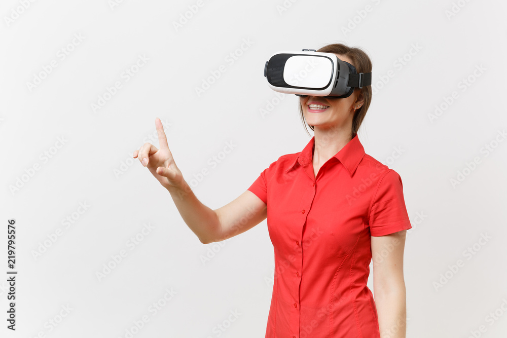 Business woman in headset of virtual reality on head touch something like push on button or pointing at floating virtual screen isolated on white background. Education future in high school concept. Business woman in headset of virtual reality on head touch something like push on button or pointing at floating virtual screen isolated on white background. Education future in high school concept.