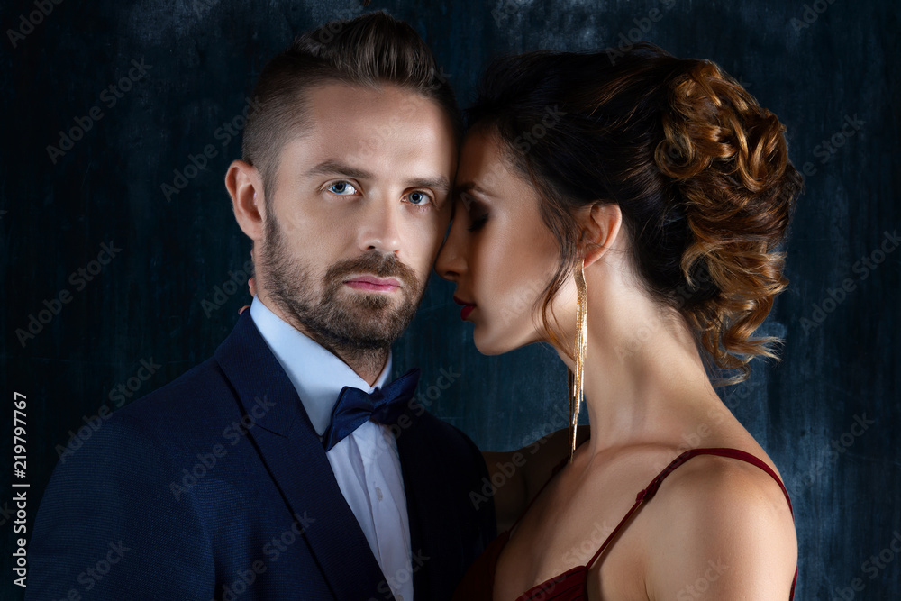 Fotka „Body part. Sexy elegant luxury woman female with red lips tempts  millionaire rich male man in skirt. Sexual issues, sex, relationship,  dating concept,“ ze služby Stock | Adobe Stock