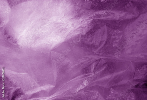 Plastic transparent old wrap texture in violet