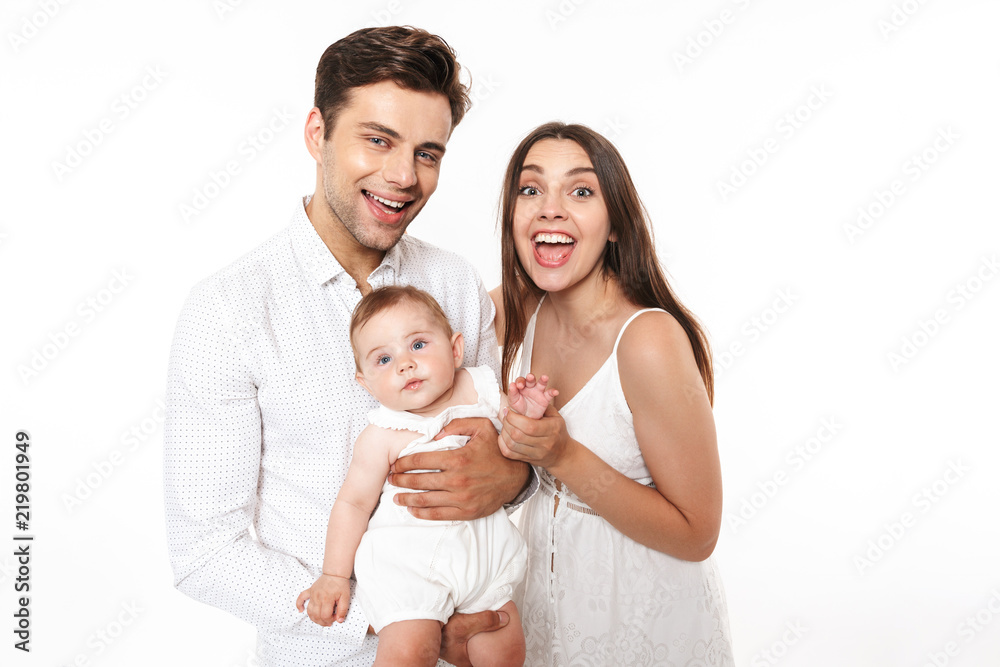 Portrait of a smiling young family with their little baby girl Portrait of a smiling young family with their little baby girl