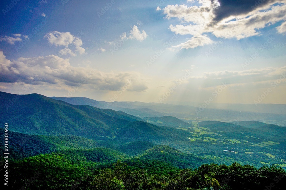 sun rays over mountains sun rays over mountains