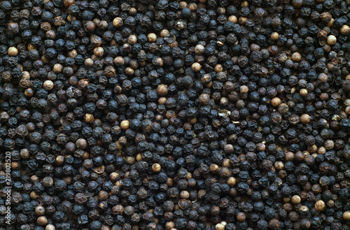 Black pepper close-up with blur effect.