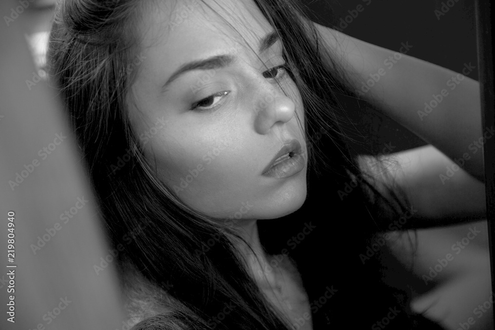 Portrait photos of the girl.Sad girl.Nice lips.Black white photo Portrait photos of the girl.Sad girl.Nice lips.Black white photo